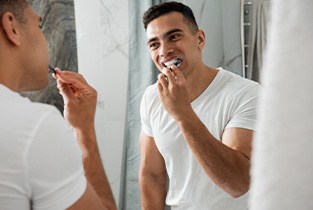 Man brushing teeth