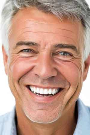 Portrait of handsome senior man with nice teeth