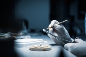 a dental lab technician making veneers